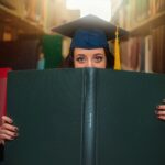 woman holding book